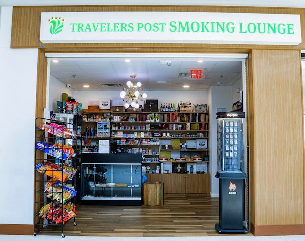 You can vape at Nashville International Airport in the Travelers Post Smoking Lounge.