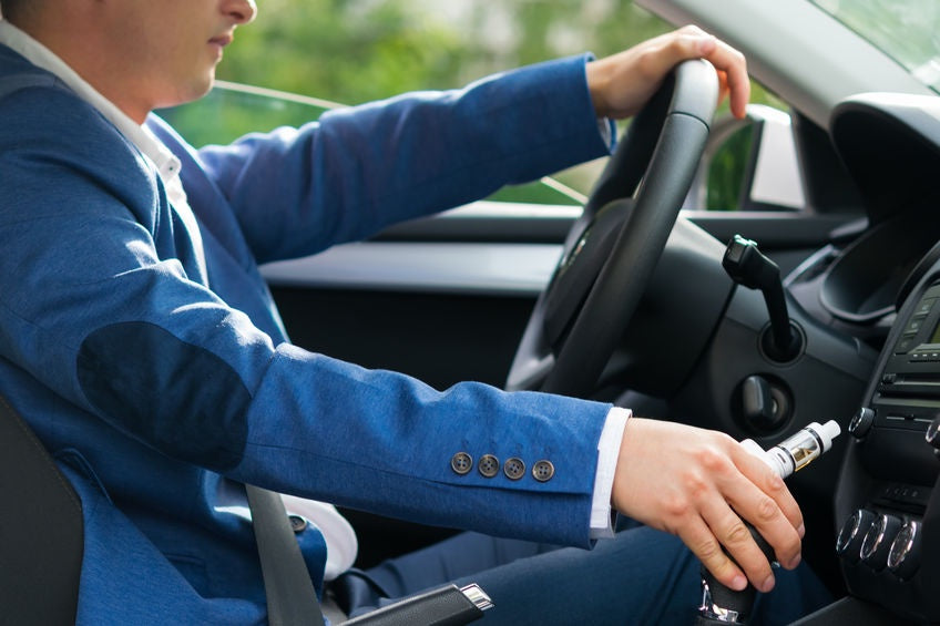 If you're going to vape in your car, you can open a window to prevent a lingering smell.