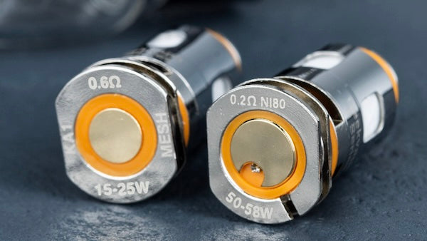 The straight edges on the bottom of a Geek Vape coil need to be aligned properly, or you won't be able to push the coil all the way in.